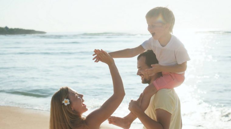 Happiness Happy family on the beach